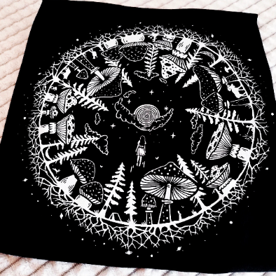 Black and white mushroom design print on a gothic unisex t-shirt. 