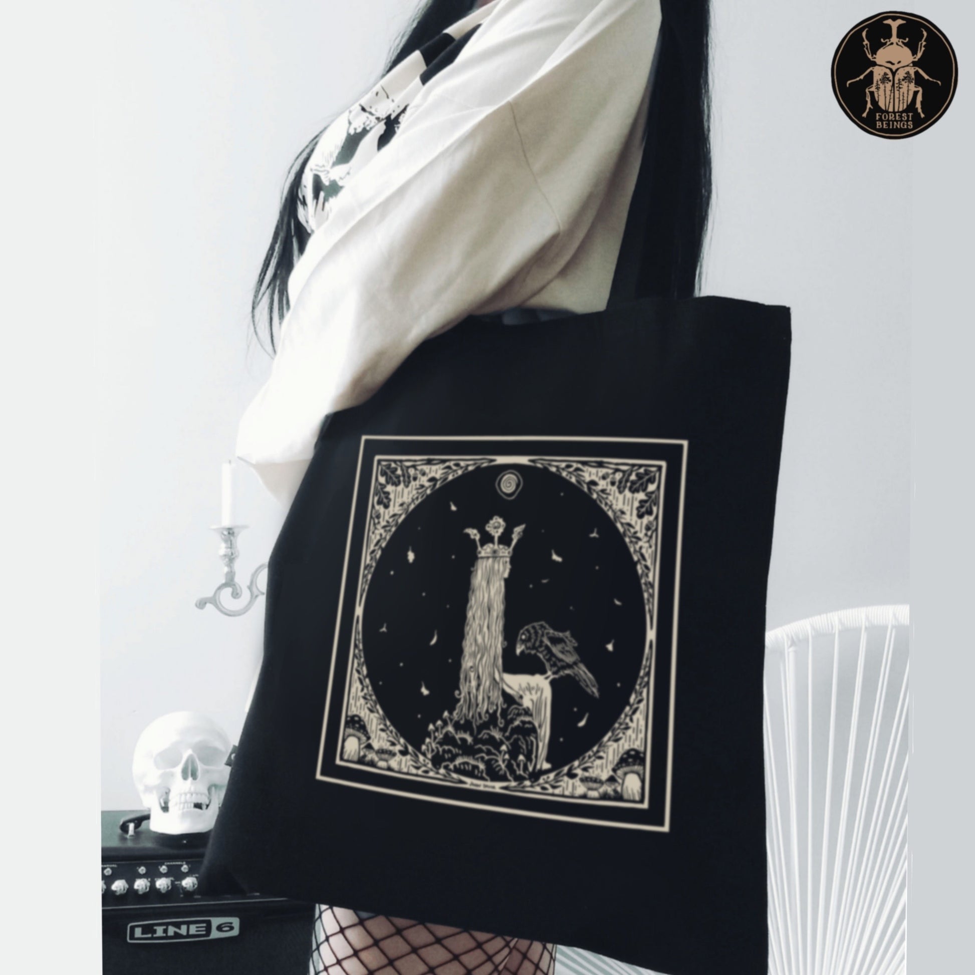 Sitting Princess Tuvstarr fairytale design on a gothic aesthetic tote bag.